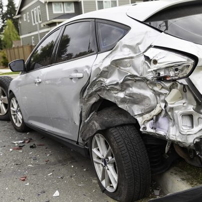 A car smashed from the rear severely damaged